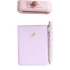 Pink notebook with pen, pink seal, white lace fabric, wooden desktop, silver butterfly, white star pendant Item Picture